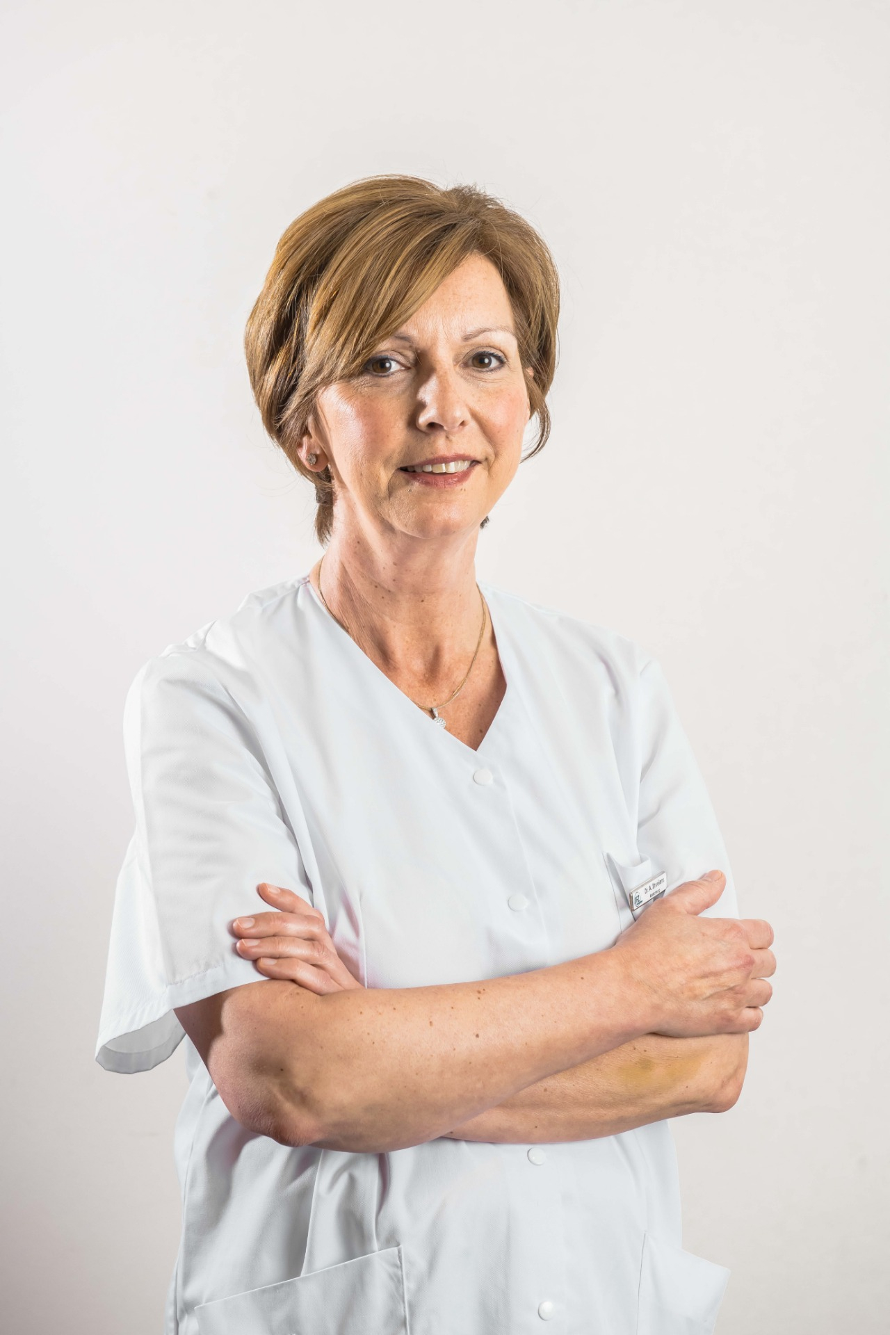 Dr. Anne Struelens
